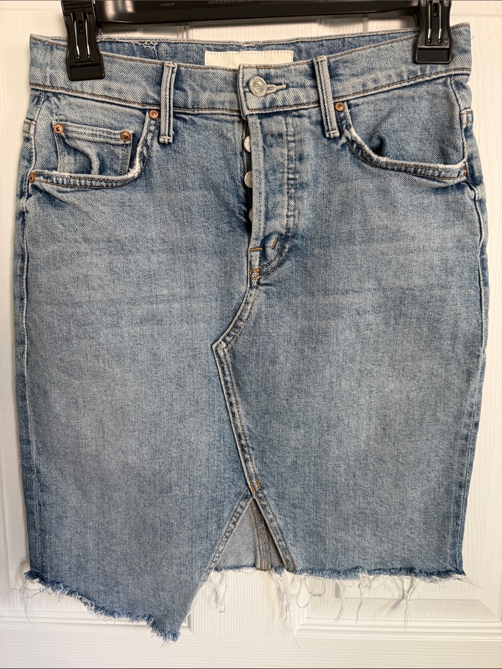 MOTHER Light Wash Denim Tomcat Slide Mini Fray Skirt